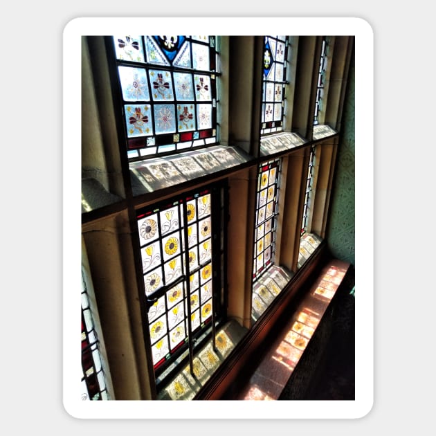 Light through a stain glass window - Cragside House, Northumberland, UK Sticker by richflintphoto